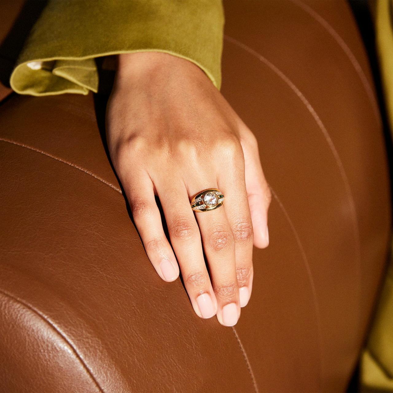 Gold Olive ring with white topaz and emerald green stone Jewellery & Watches V by Laura Vann    - Collagerie