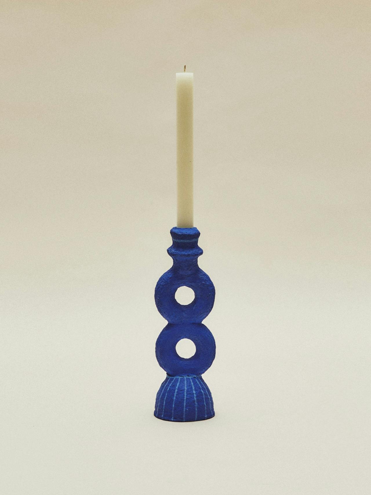 Eight-shaped papier-mâché candlestick