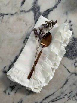 White ruffle napkin  Domenica Marland    - Collagerie