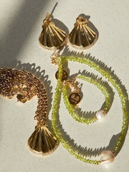 Gold and peridot Willow necklace Jewellery & Watches By Alona    - Collagerie