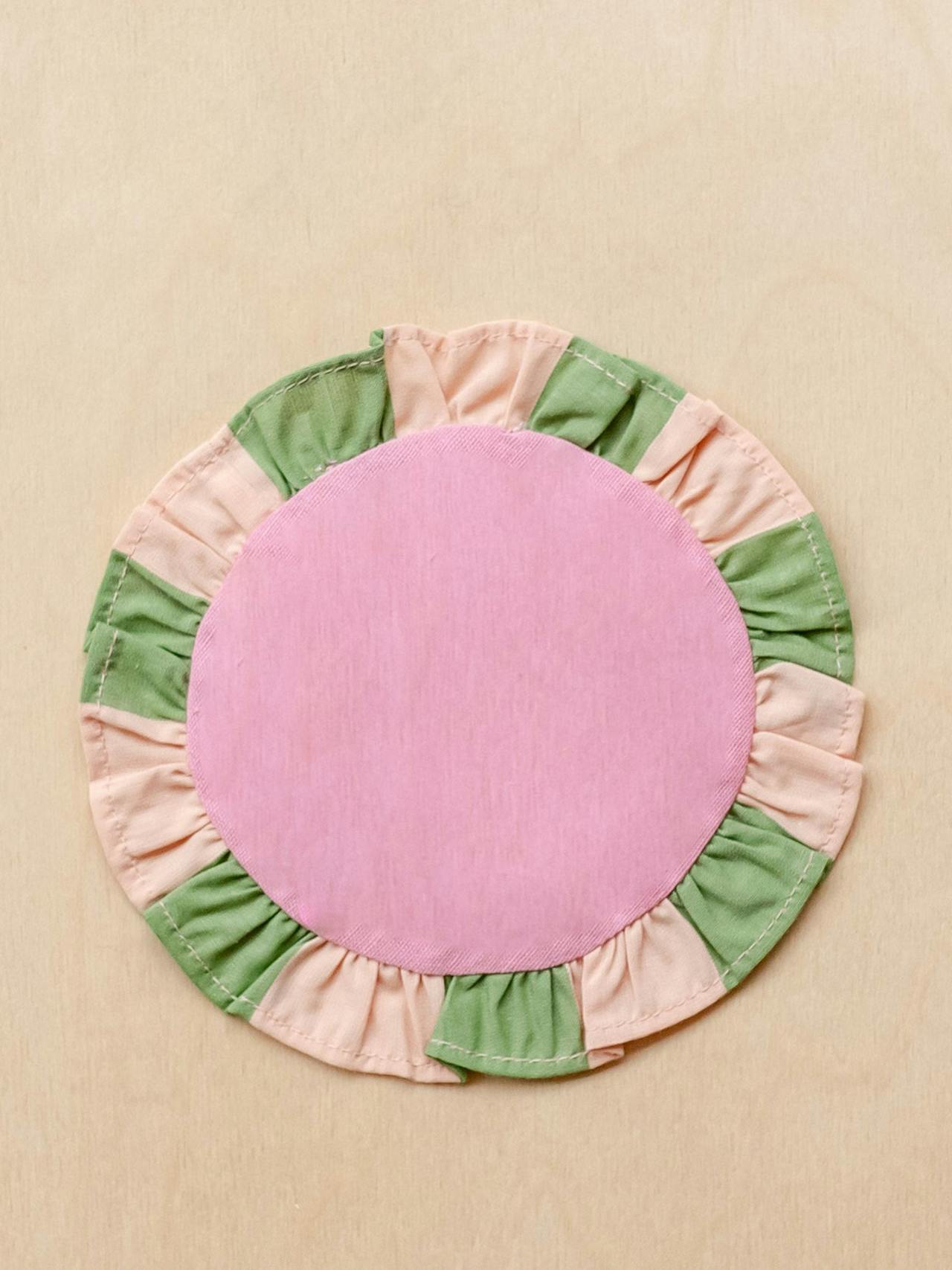 Cotton coasters in pink and green, set of 2