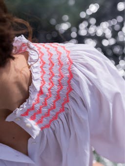 Cleopatra blouse white with sour watermelon hand smocking edition 9  Smock London    - Collagerie