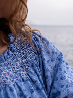 Grace darling dress flower power chambray with opaline hand smocking  Smock London    - Collagerie