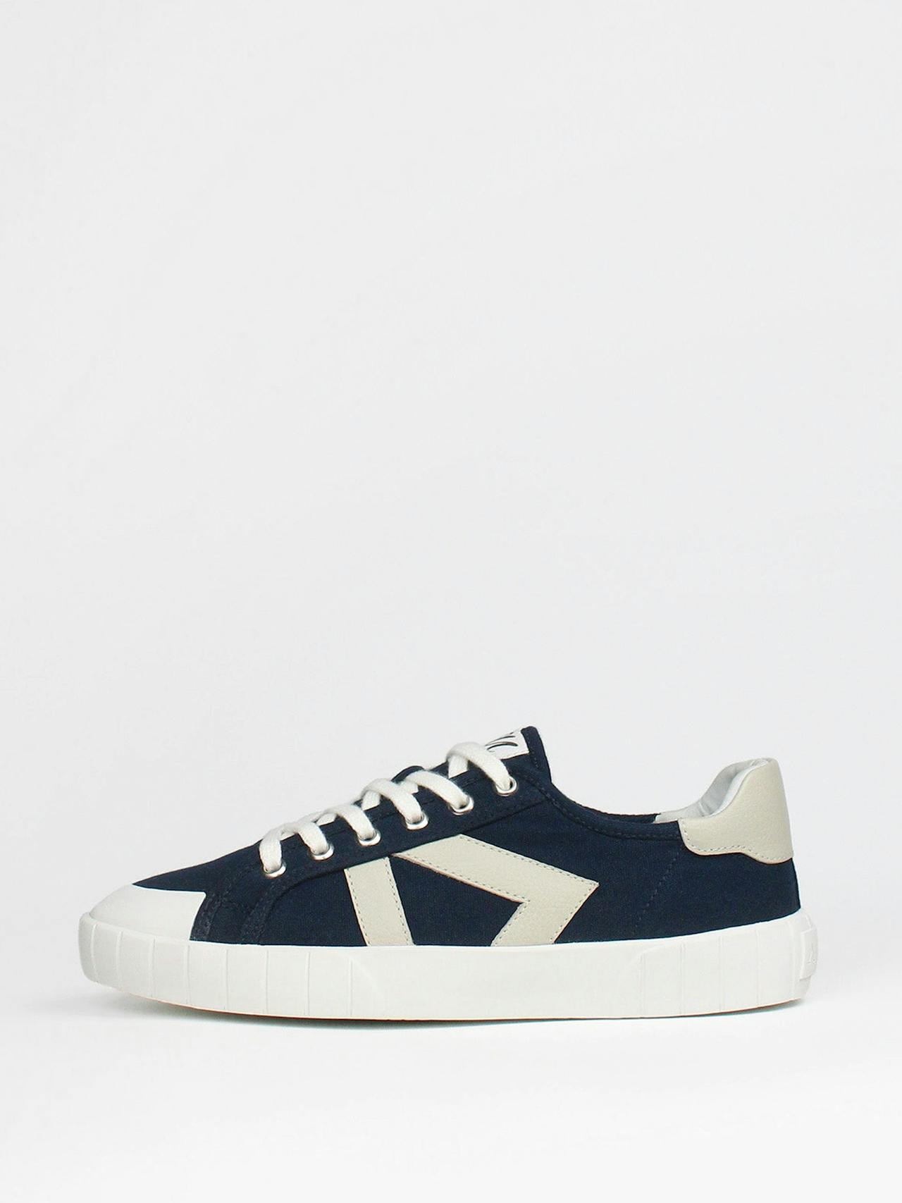 The Helios navy and beige trainers