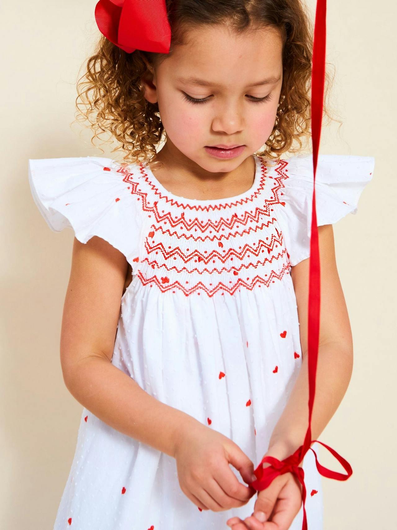 Indira dress love is in the air Plumetti with big love hand smocking  Smock London    - Collagerie