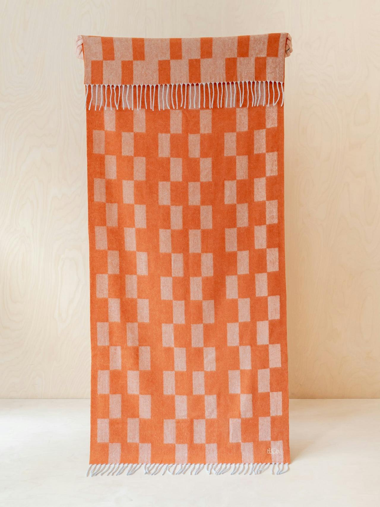 Lambswool kids blanket in orange checker