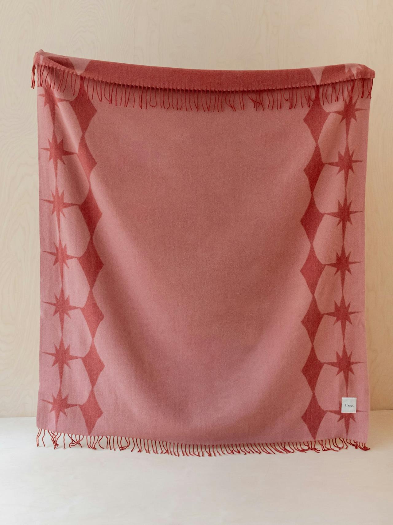 Lambswool blanket in reversible pink celestial