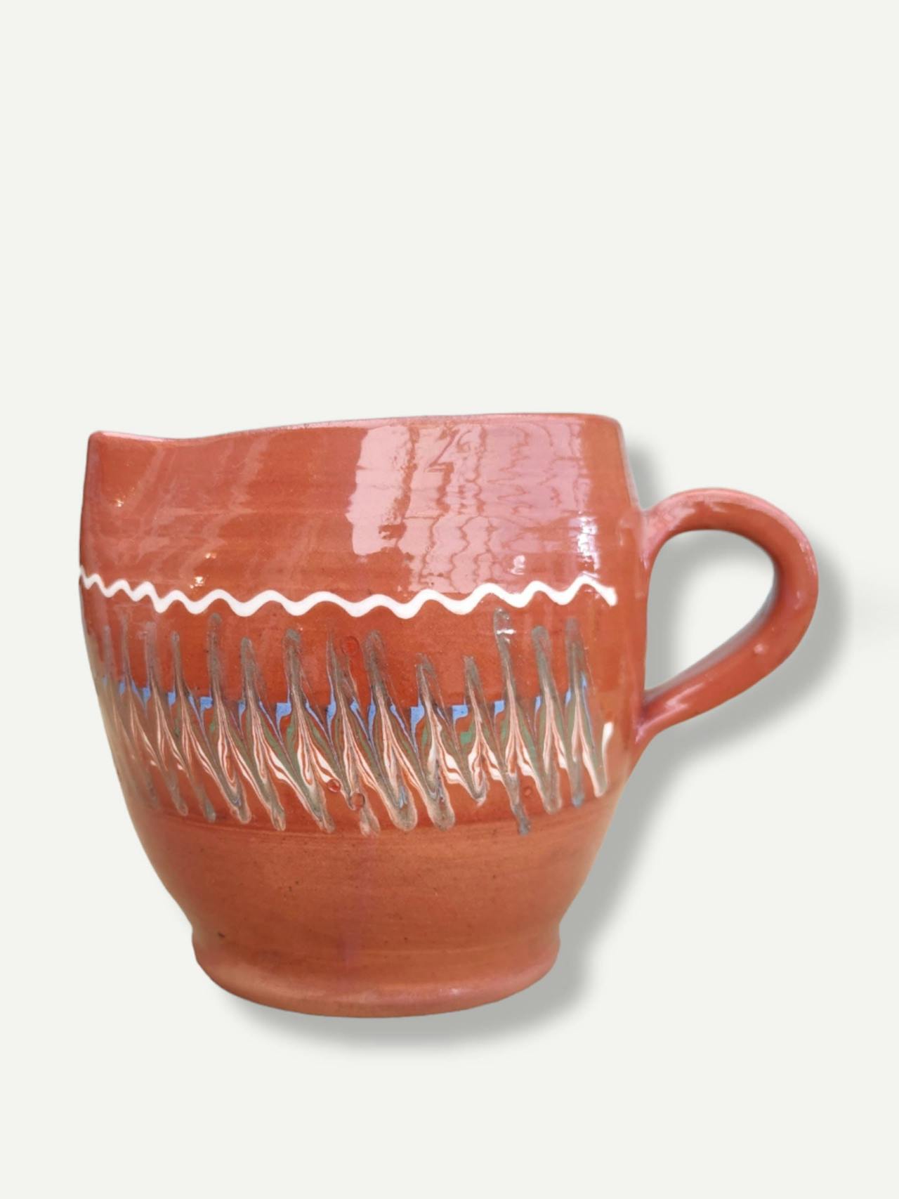 Tan barrel jug