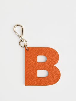 The orange and baby blue letter charm  London Velvet    - Collagerie