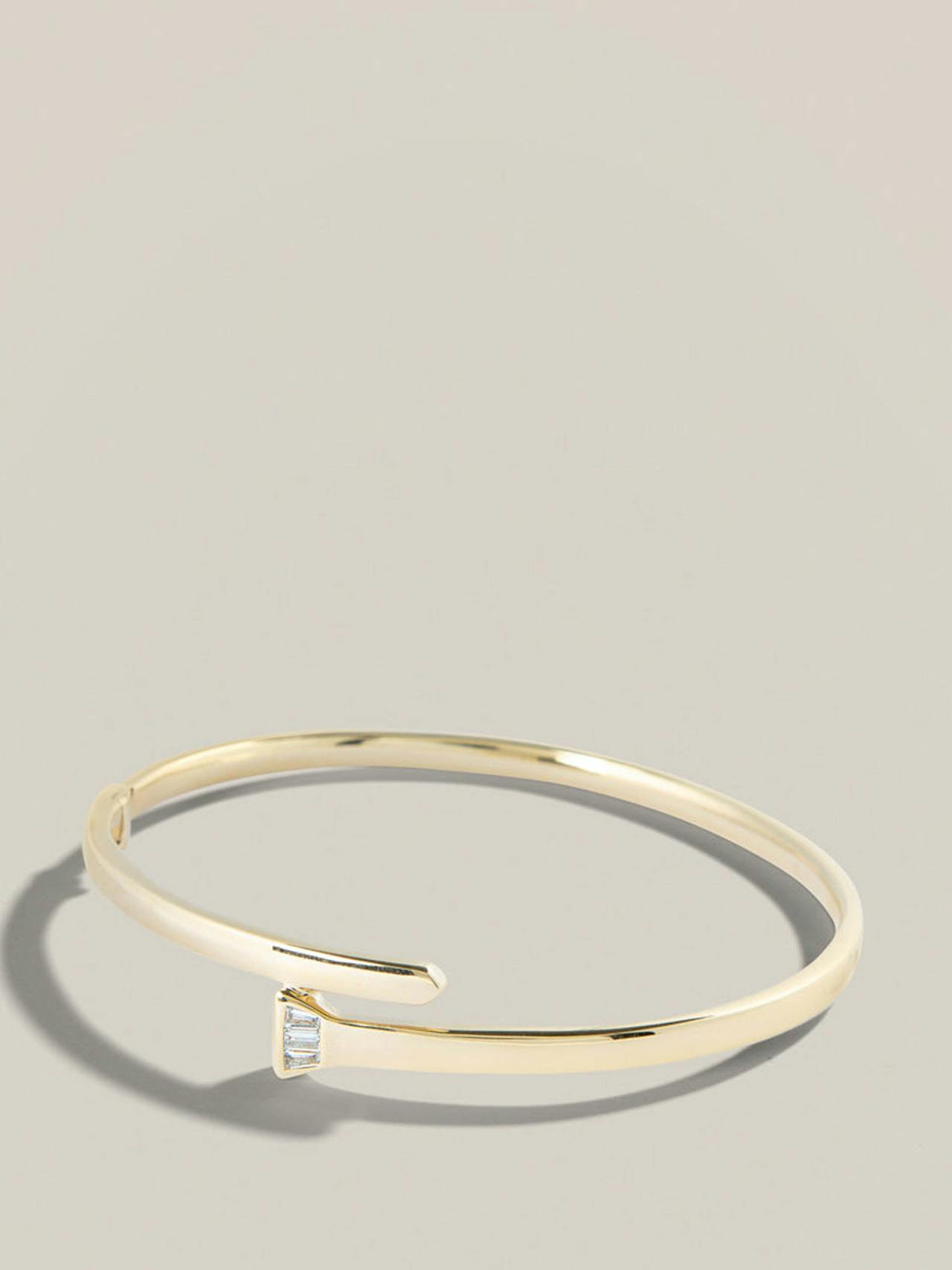 The Lucky One gold and diamond bangle