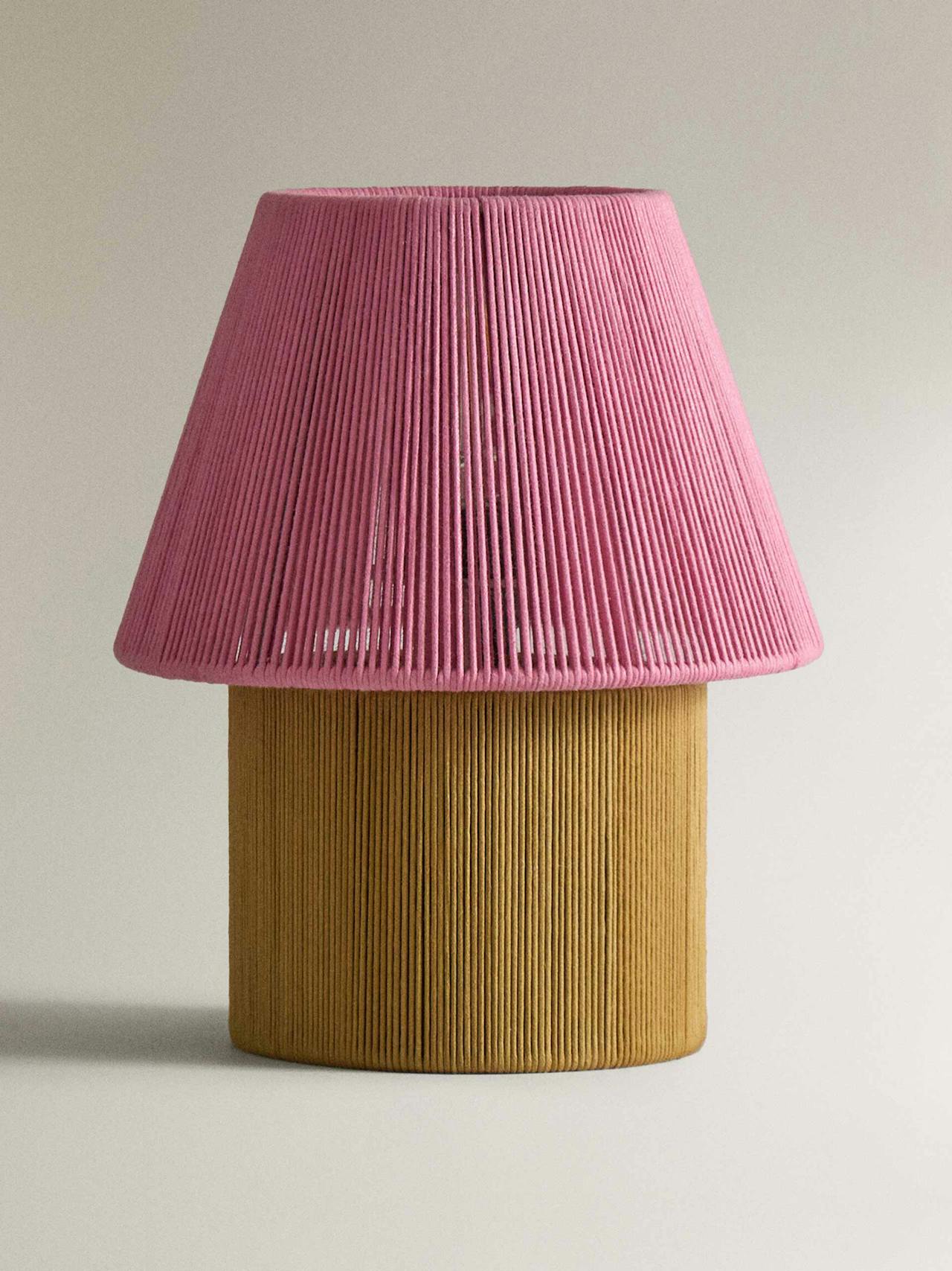 Table lamp with cord shade