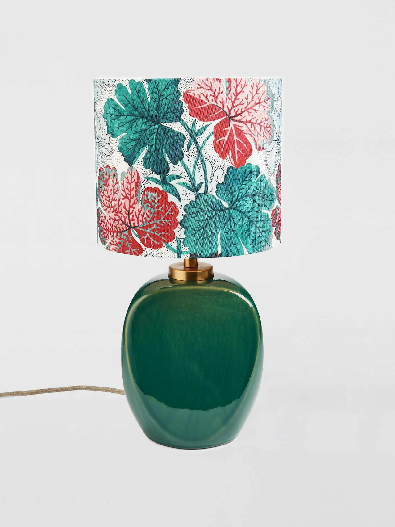 Geranium print small faceted ceramic table lamp, green