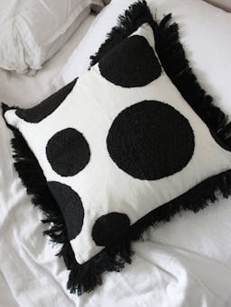 Black tufted linen cushion cover interiors Amuse La Bouche    - Collagerie