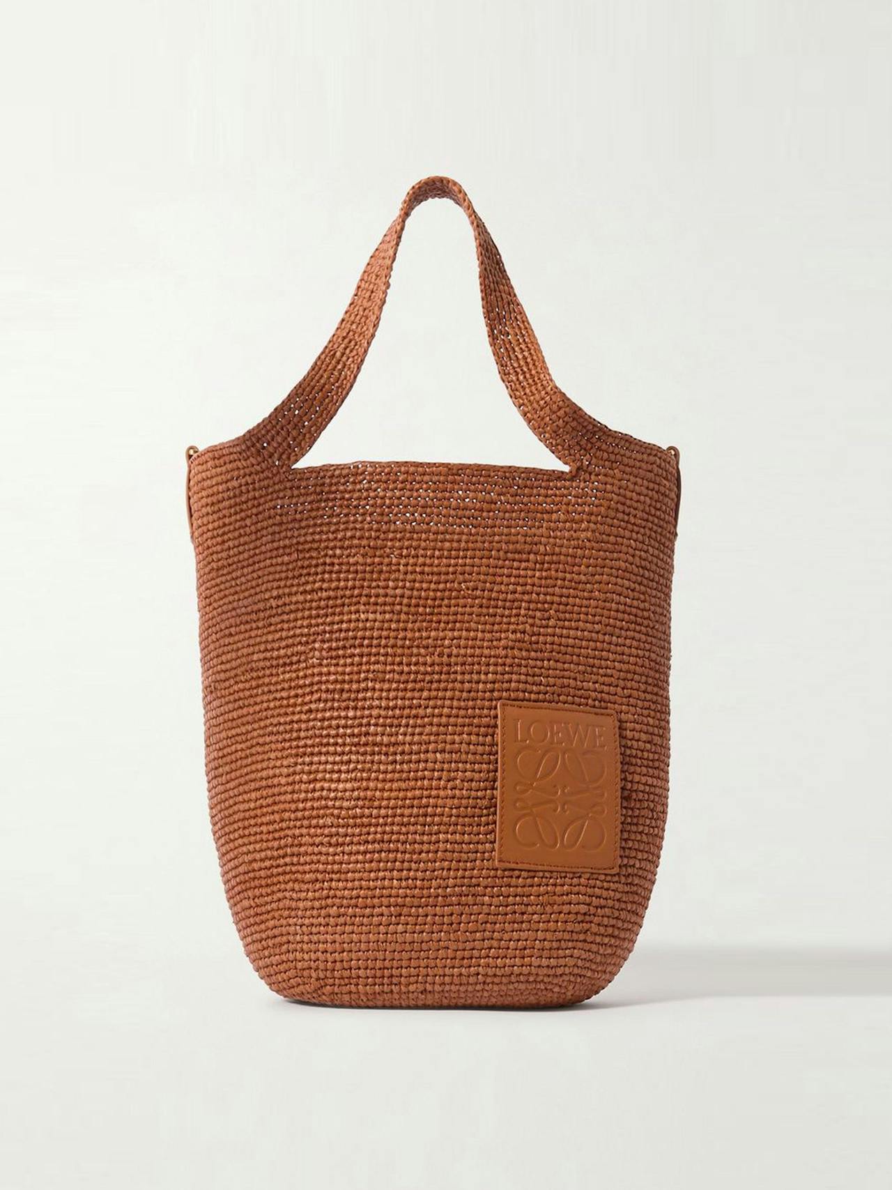 Slit embossed leather-trimmed raffia tote bag