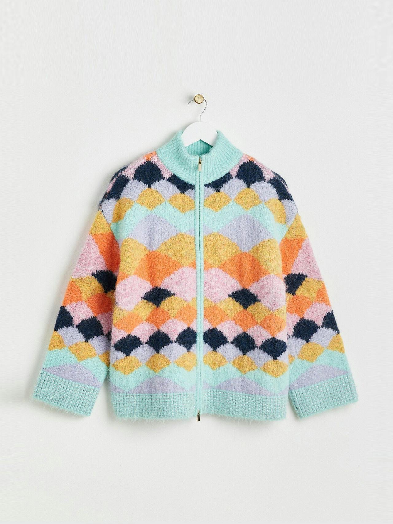 Scalloped pattern knitted zip up cardigan