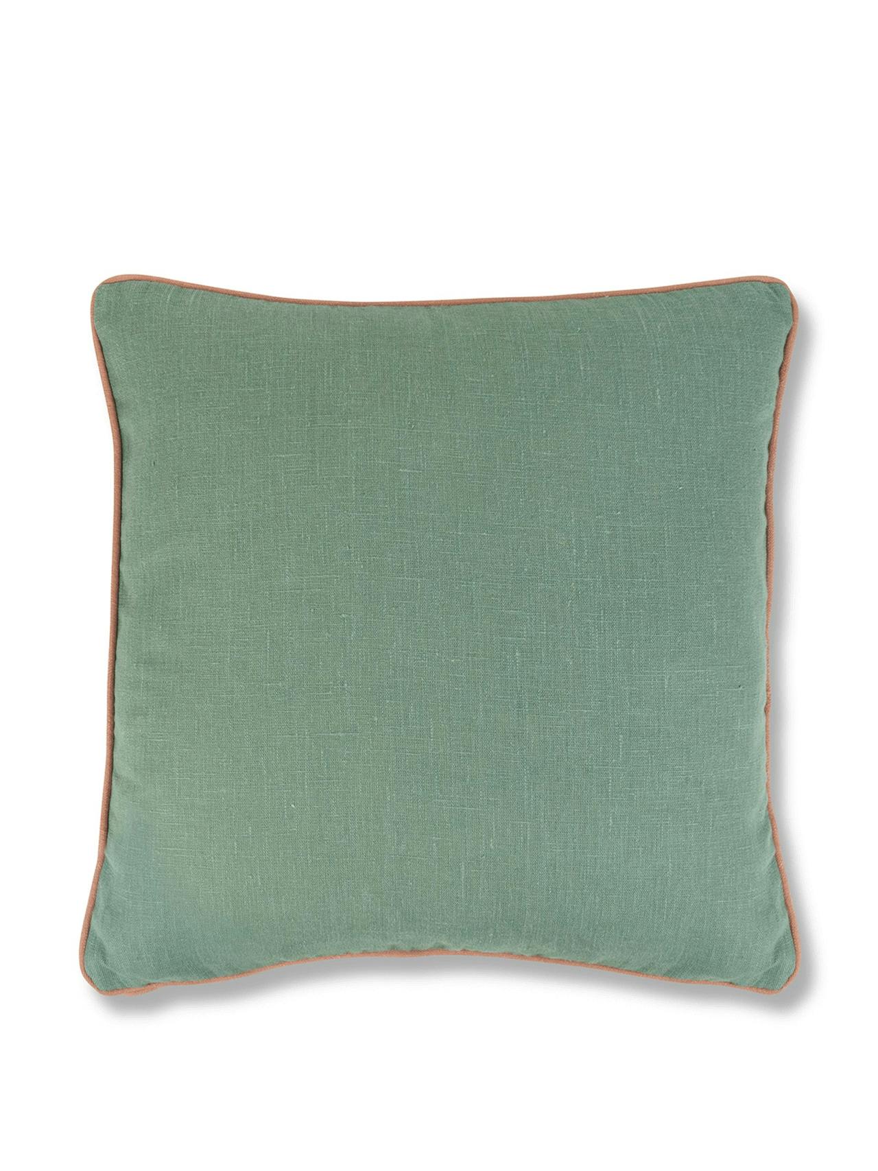 Teal cushion with terracotta sirin trim