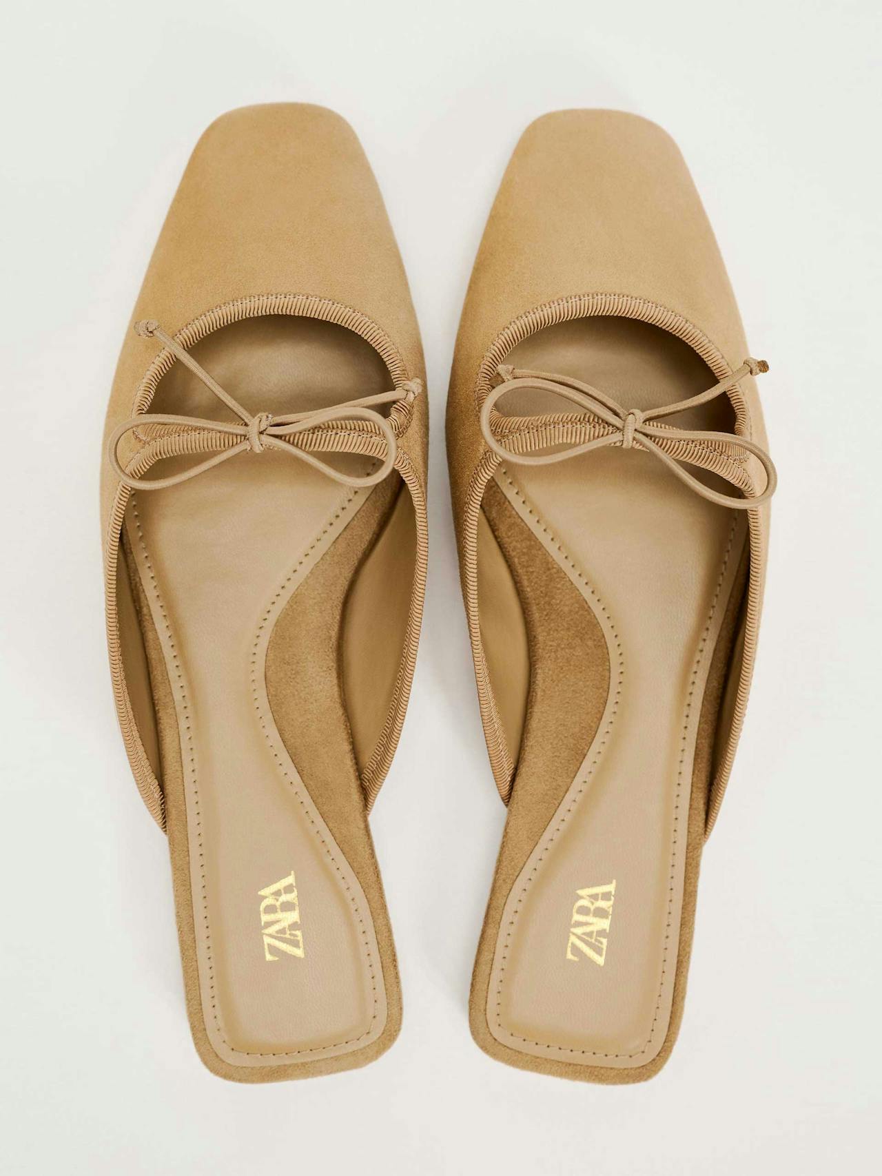 Leather mules with bow detail