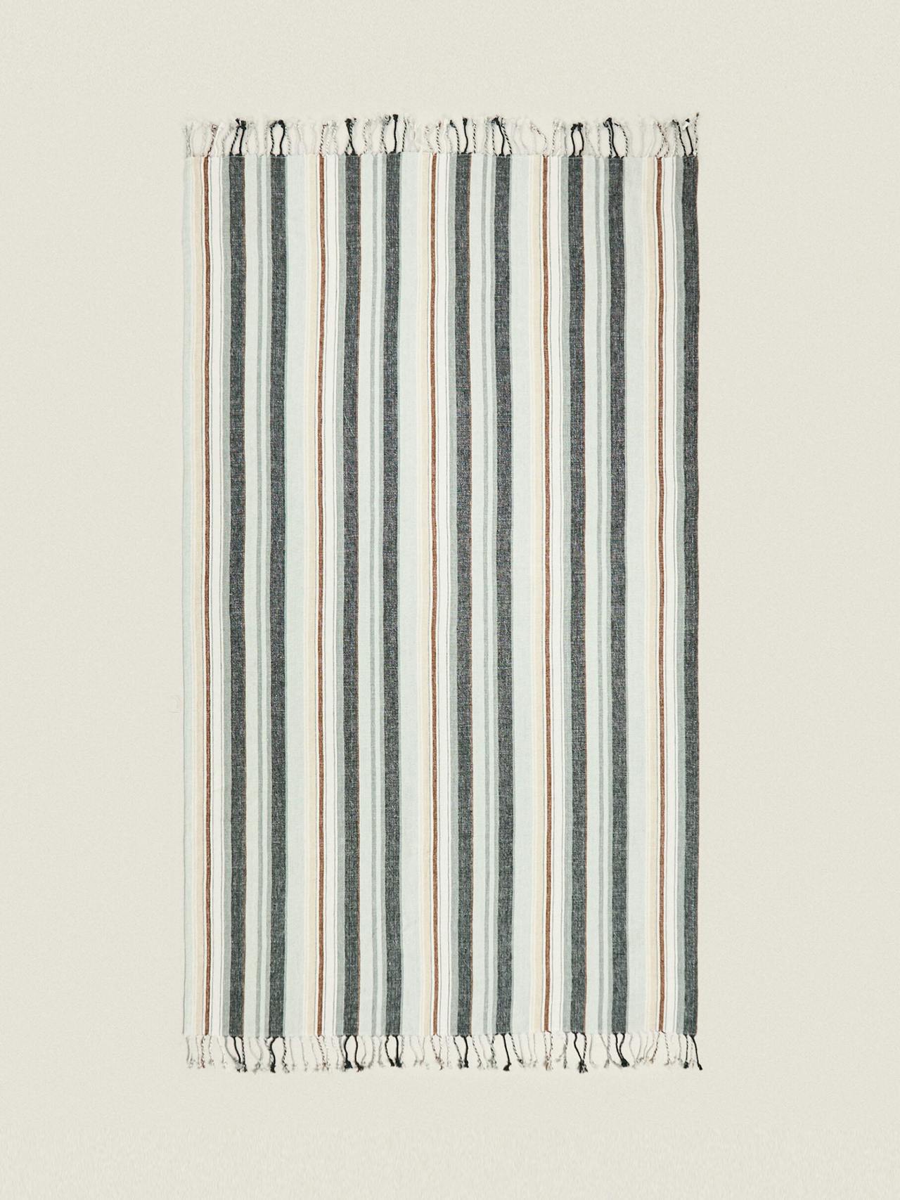 Striped cotton beach towel with fringing