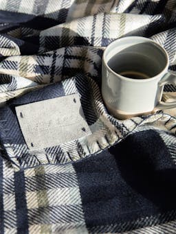 The Blanket in green and navy check Interiors Navygrey    - Collagerie