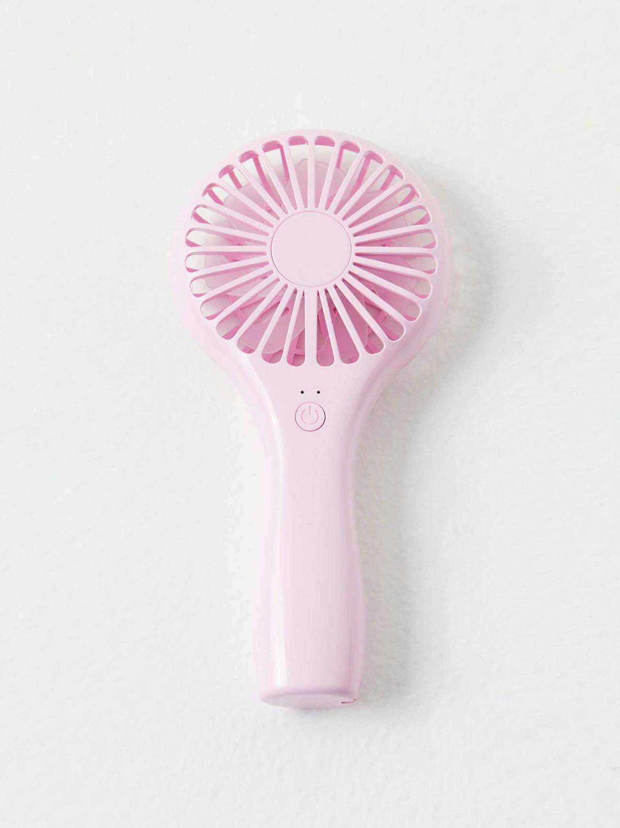 Light pink handheld fan