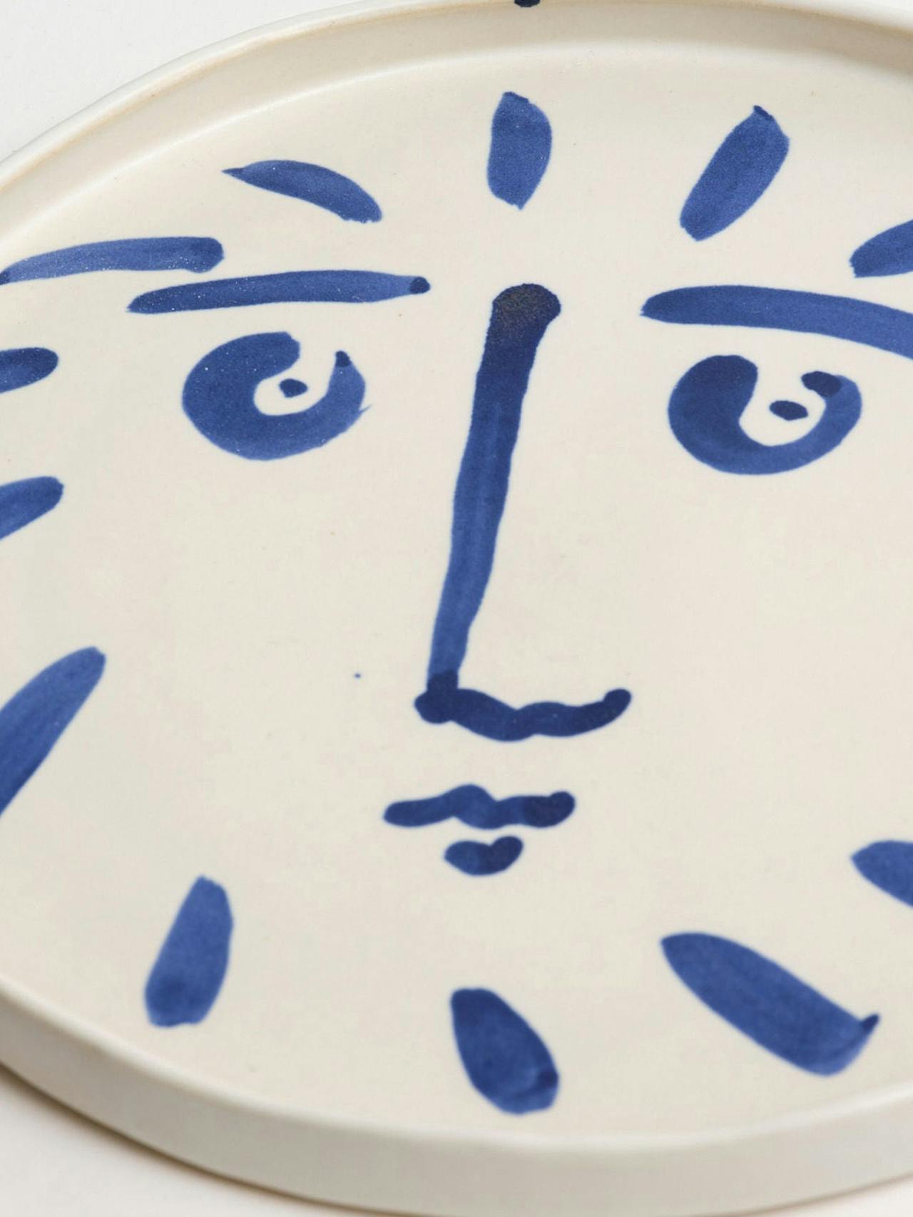 Blue sun face serving platter Interiors KS Creative Pottery    - Collagerie