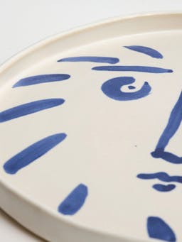 Blue sun face serving platter Interiors KS Creative Pottery    - Collagerie