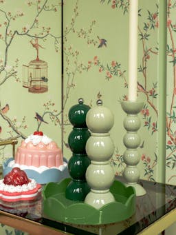 Short bobbin candlestick in sage green Interiors Addison Ross    - Collagerie