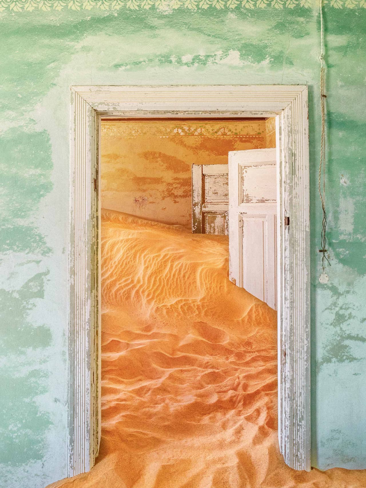 147-kolmanskop-nambia-doors-sand-@alina rudya Image: Kolmanskop @alina_rudya